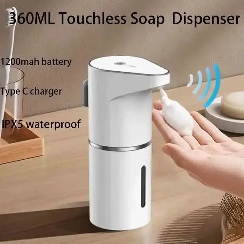 Hand activating the sensor on a white foaming soap dispenser