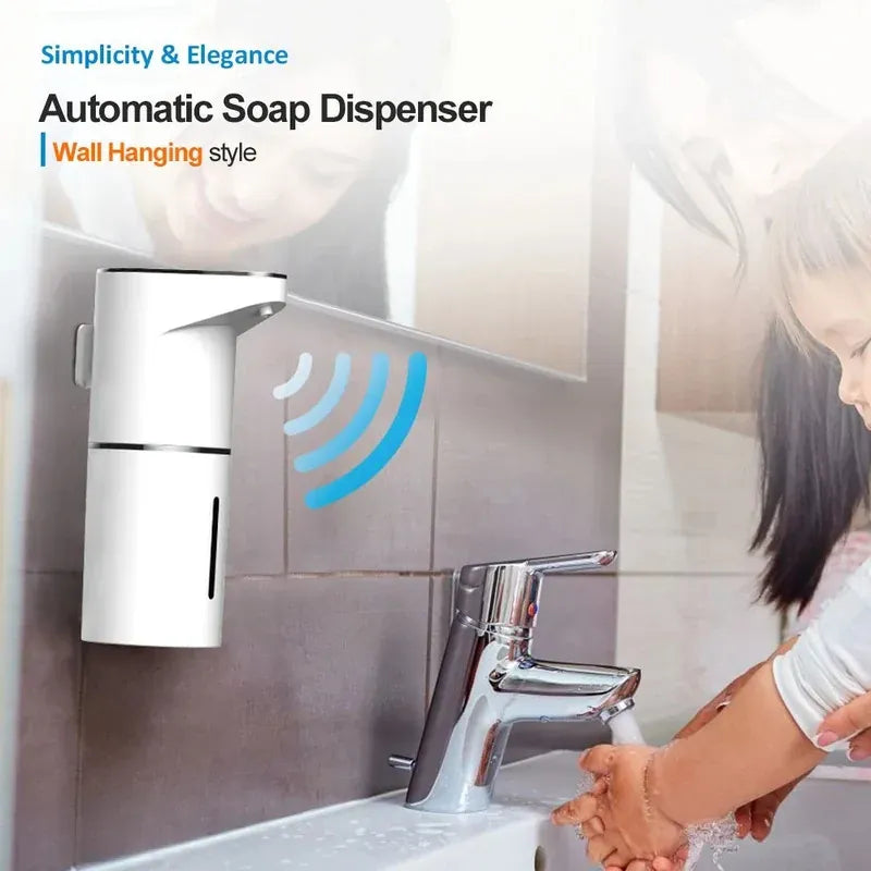 Wall-mounted touchless foaming soap dispenser installed above a bathroom sink