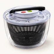 3L Press-Style Salad Spinner on a warm off-white background with a soft natural shadow.