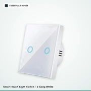 A 2-gang white smart touch light switch by Essentials House, featuring a glossy glass face with two circular blue