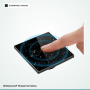 A square black touch panel with a finger touching the center, shown on a light gray background with blue water droplet