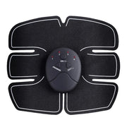 Black electronic muscle stimulator pad with control panel on a white background