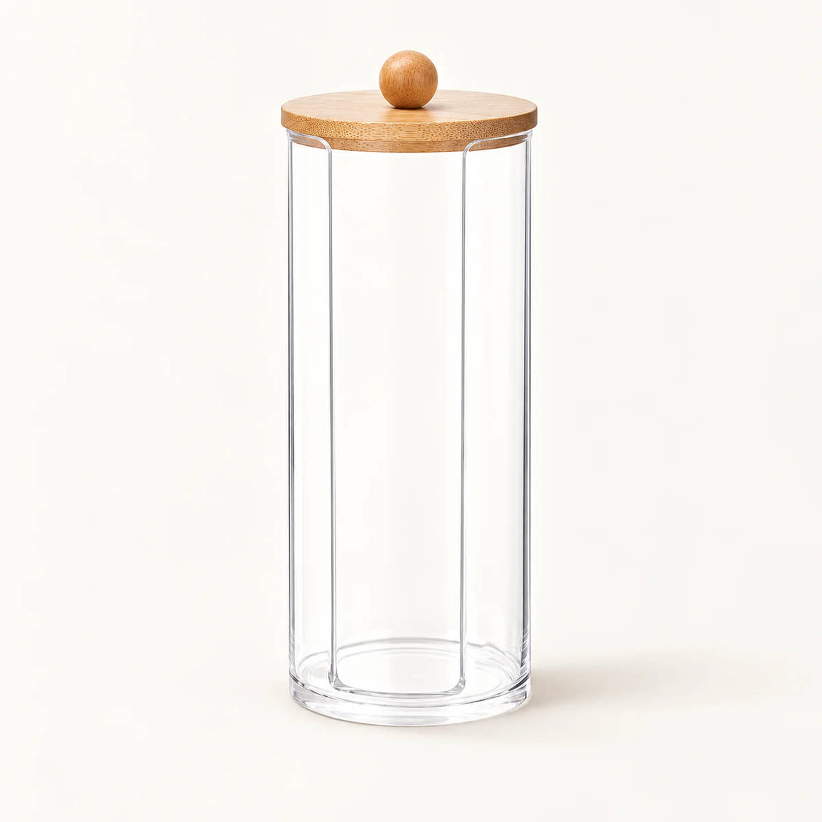 Clear cylindrical bathroom storage jar with wooden knob lid
