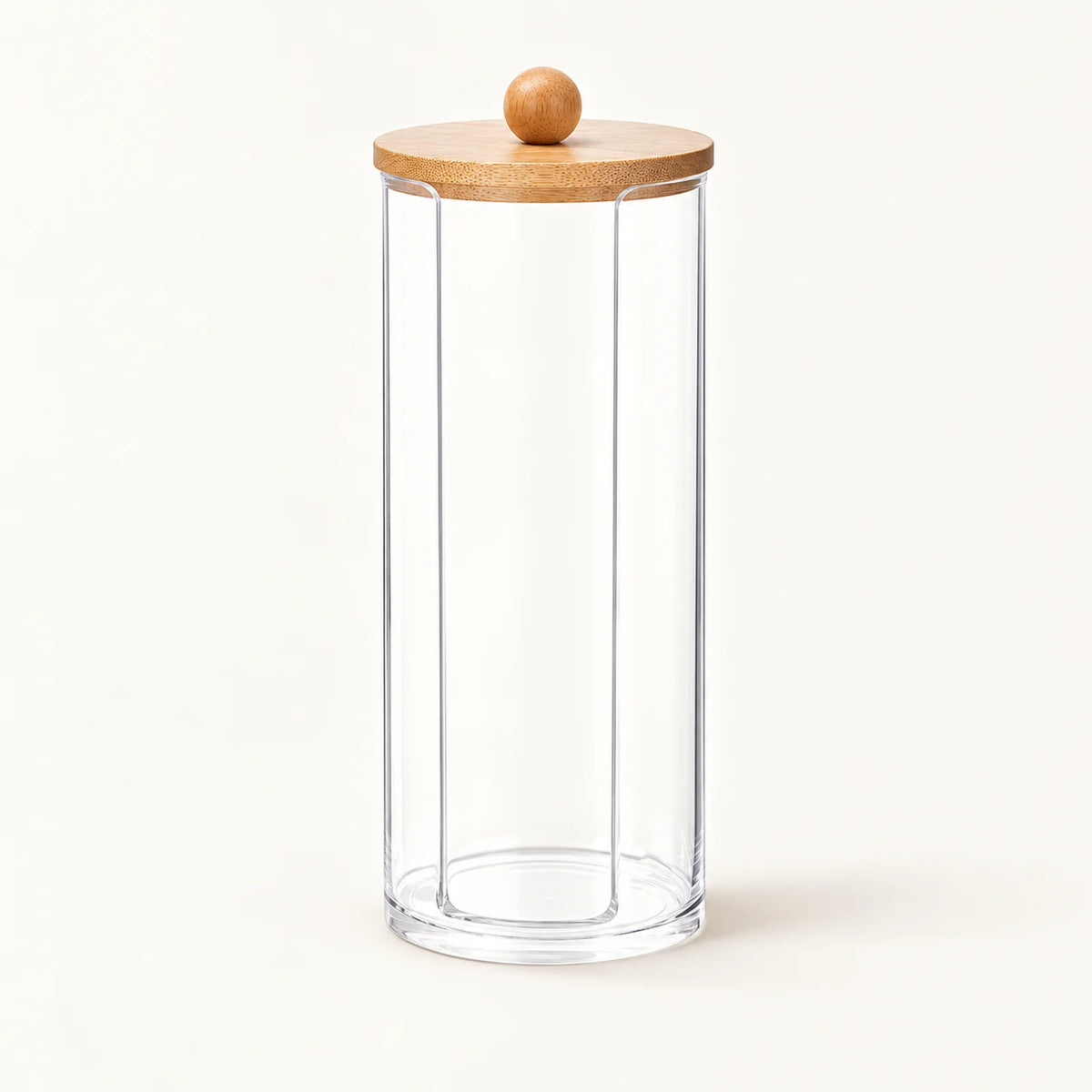 Clear cylindrical bathroom storage jar with wooden knob lid