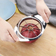 Essentials House stainless steel apple cutter slicing an apple into eight even wedges