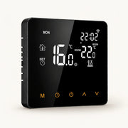 Black AVATTO WT81 thermostat with illuminated temperature display and amber touch controls on an off-white background.