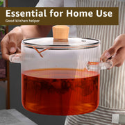 Transparent borosilicate glass cooking pot with a glass lid and wooden knob