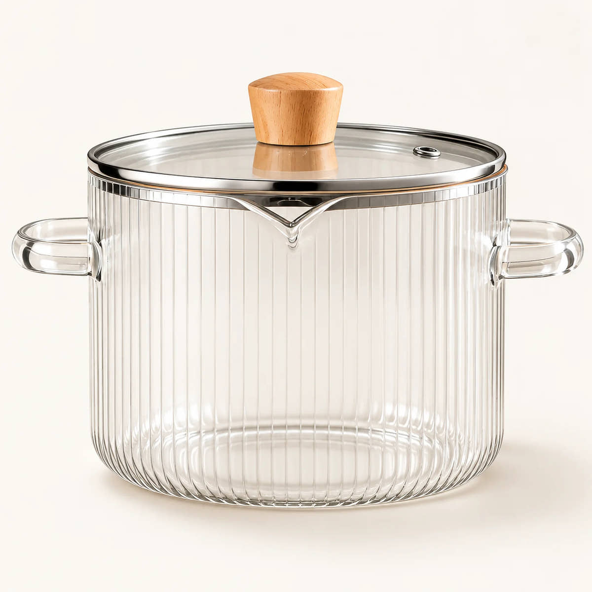 Borosilicate Glass Cooking Pot on a warm off-white background with a soft natural shadow.