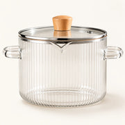 Borosilicate Glass Cooking Pot on a warm off-white background with a soft natural shadow.