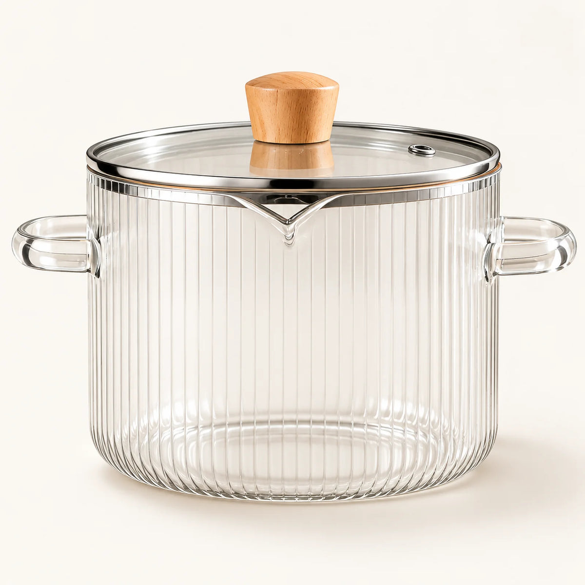 Borosilicate Glass Cooking Pot on a warm off-white background with a soft natural shadow.