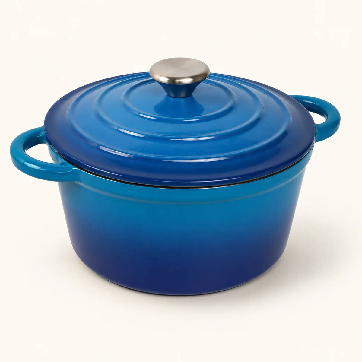 Enameled Cast Iron Soup Pot on a warm off-white background with a soft natural shadow.