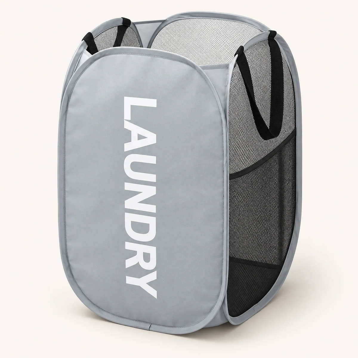 Grey mesh pop-up hamper with LAUNDRY lettering