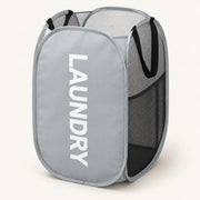 Grey mesh pop-up hamper with LAUNDRY lettering