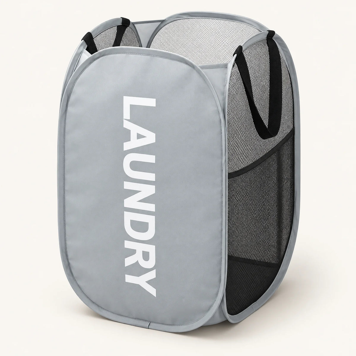 Grey mesh pop-up hamper with LAUNDRY lettering