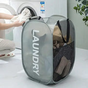 Alternate view of collapsible mesh pop-up laundry hamper with carry handles