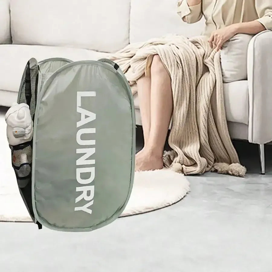 Alternate view of collapsible mesh pop-up laundry hamper with carry handles