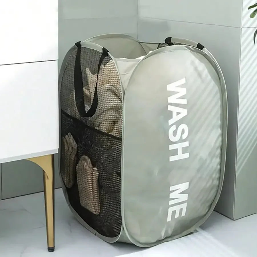 Alternate view of collapsible mesh pop-up laundry hamper with carry handles
