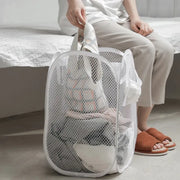 Alternate view of collapsible mesh pop-up laundry hamper with carry handles