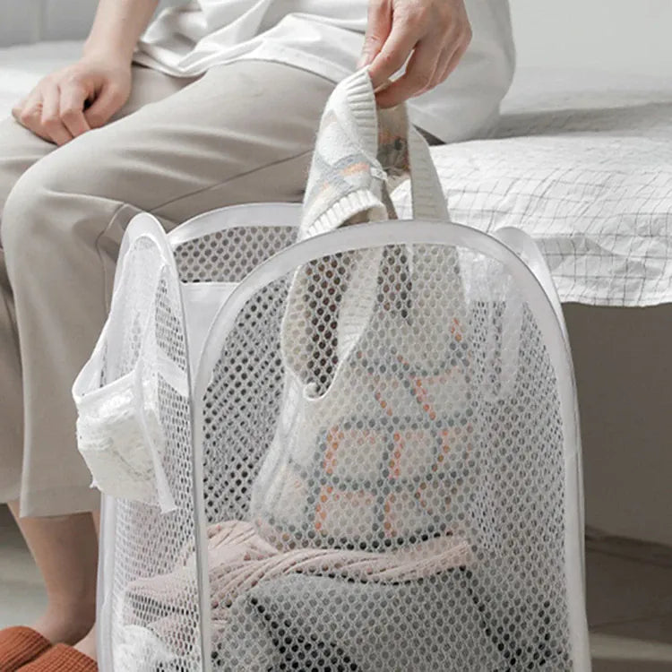 Alternate view of collapsible mesh pop-up laundry hamper with carry handles