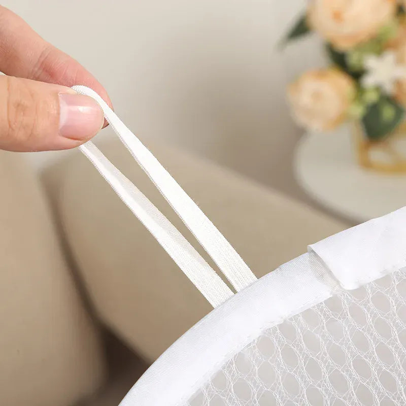 Alternate view of collapsible mesh pop-up laundry hamper with carry handles