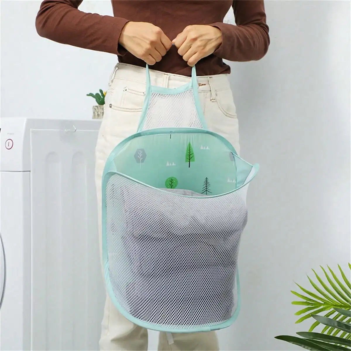 Alternate view of collapsible mesh pop-up laundry hamper with carry handles