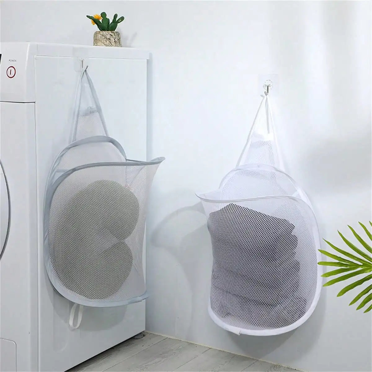 Alternate view of collapsible mesh pop-up laundry hamper with carry handles