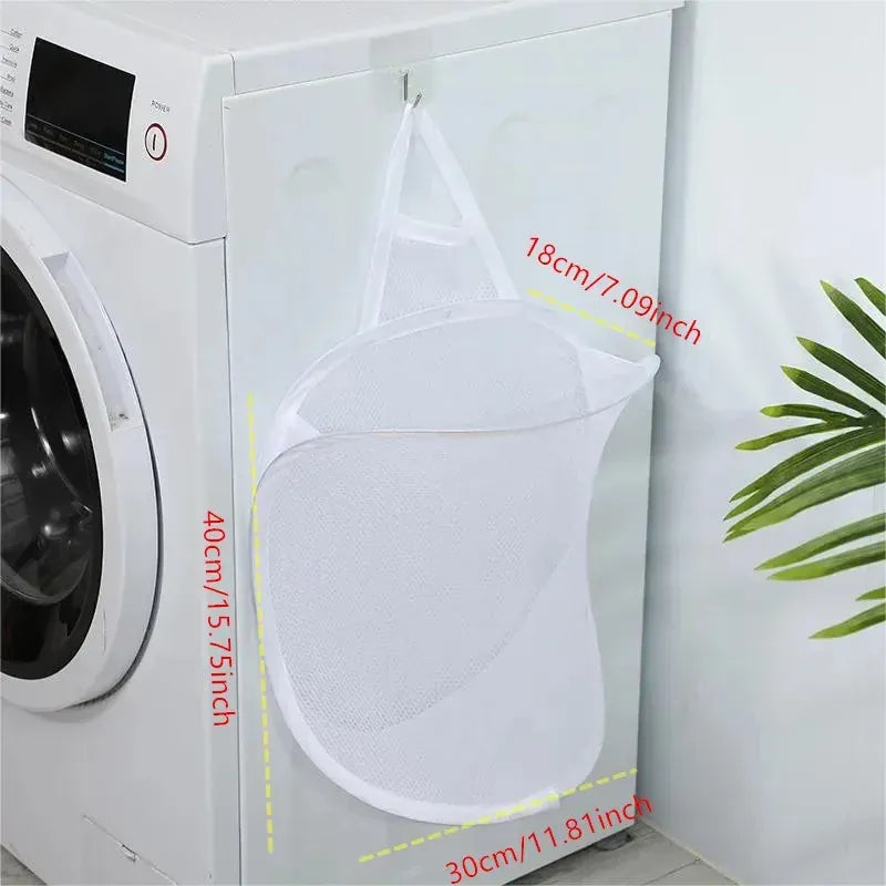 Alternate view of collapsible mesh pop-up laundry hamper with carry handles