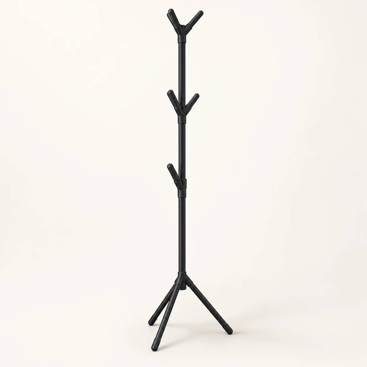 Black freestanding coat rack with tripod base