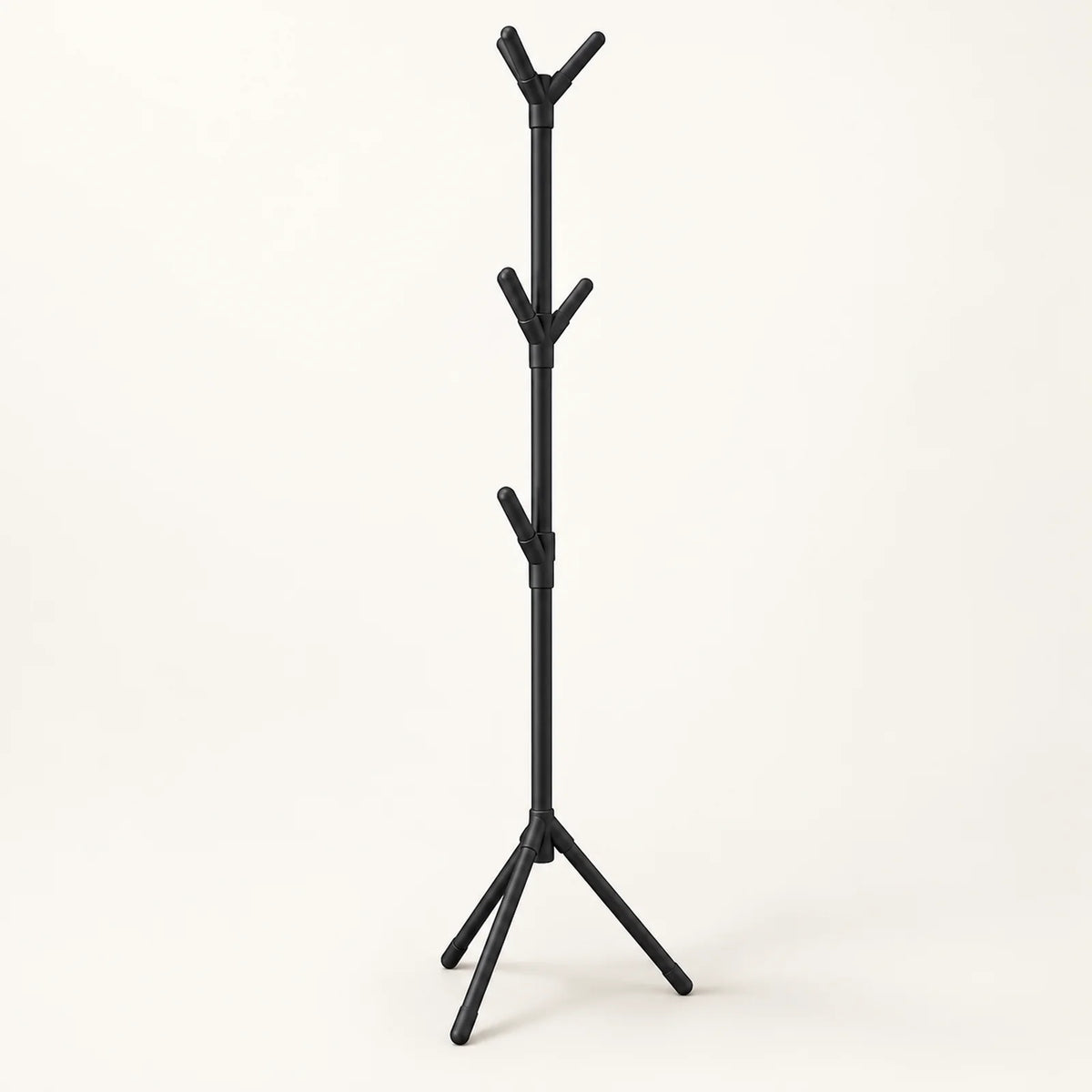 Black freestanding coat rack with tripod base