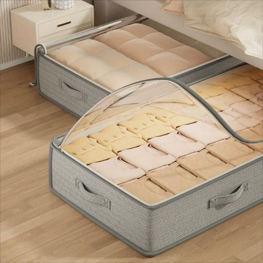 Gray under-bed storage bin filled with folded bedding