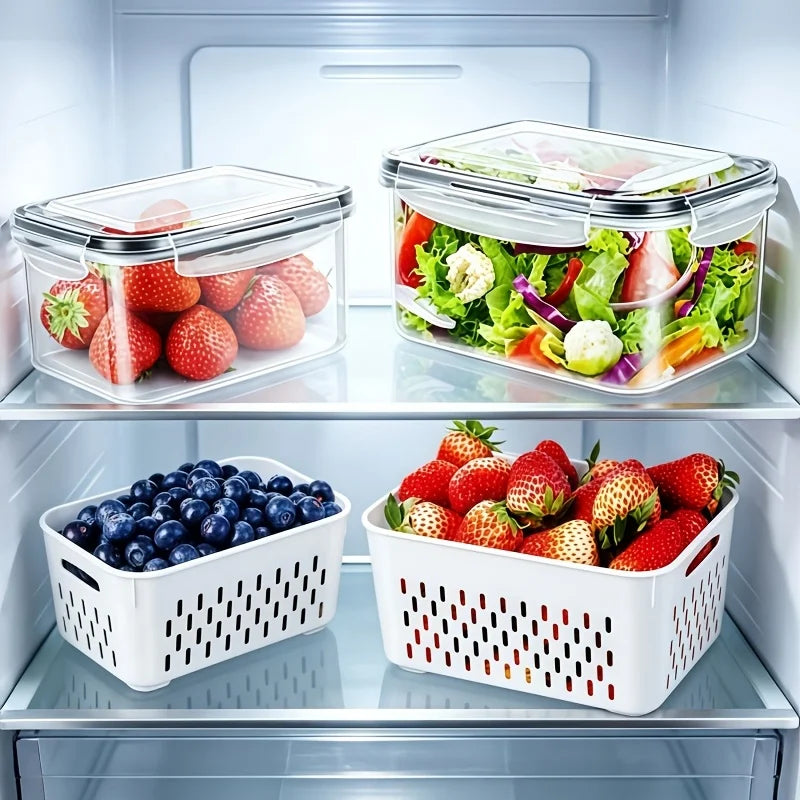 Airtight food storage containers and removable drain baskets storing berries and salad in a refrigerator
