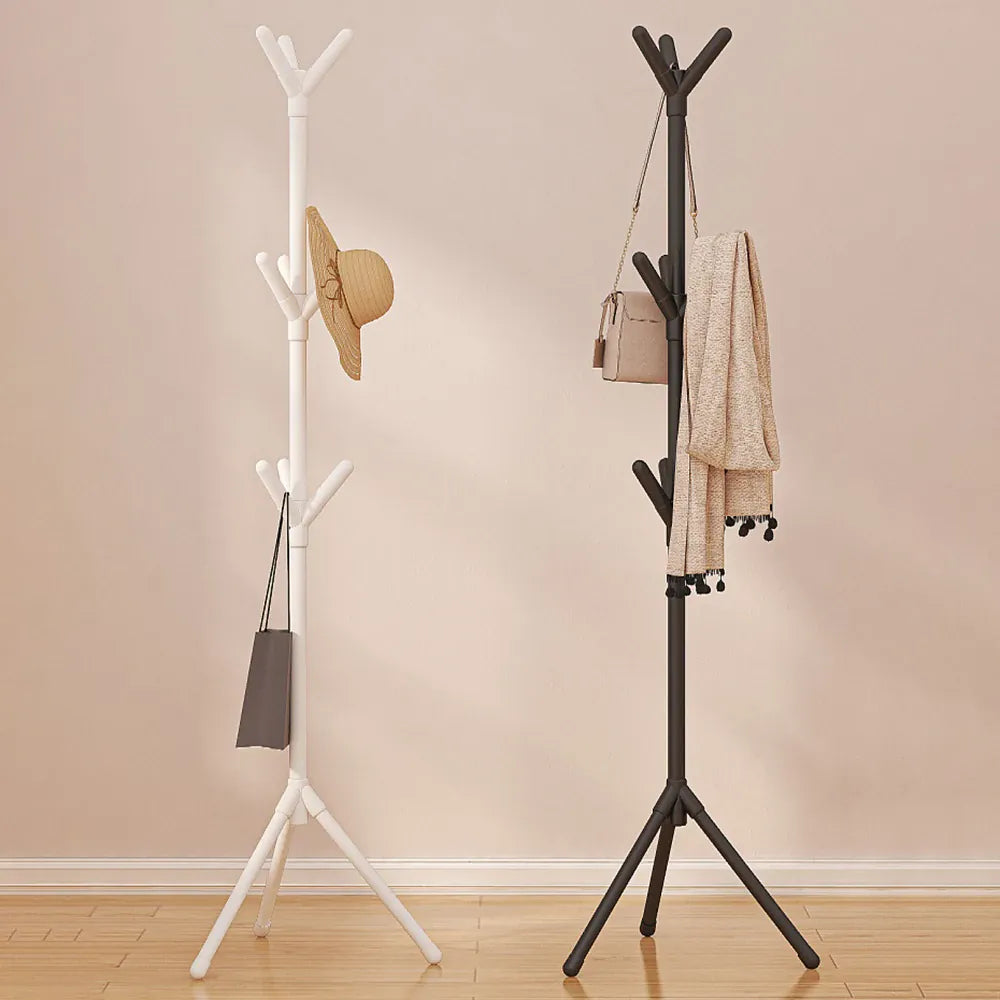 Black and white coat racks holding hats, bags, and clothing