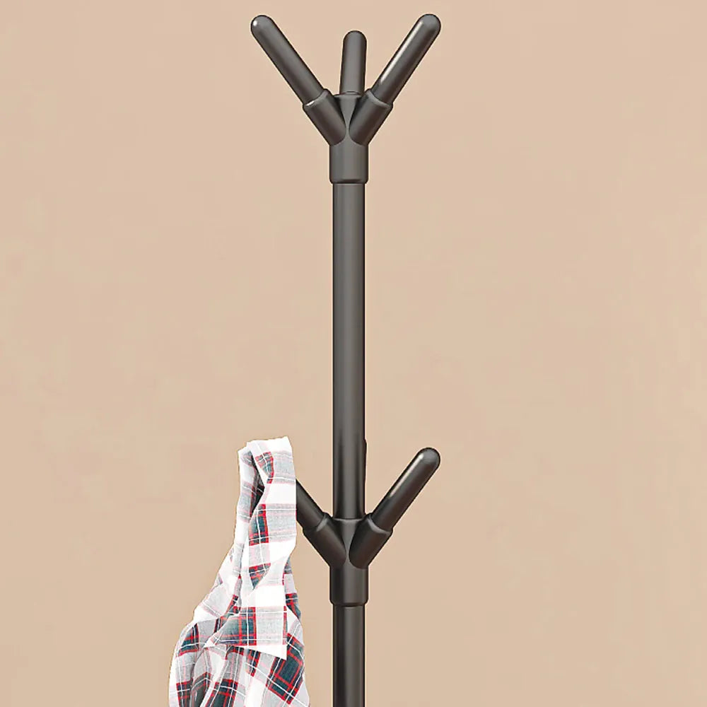 Close-up of the upper hooks on a black coat rack