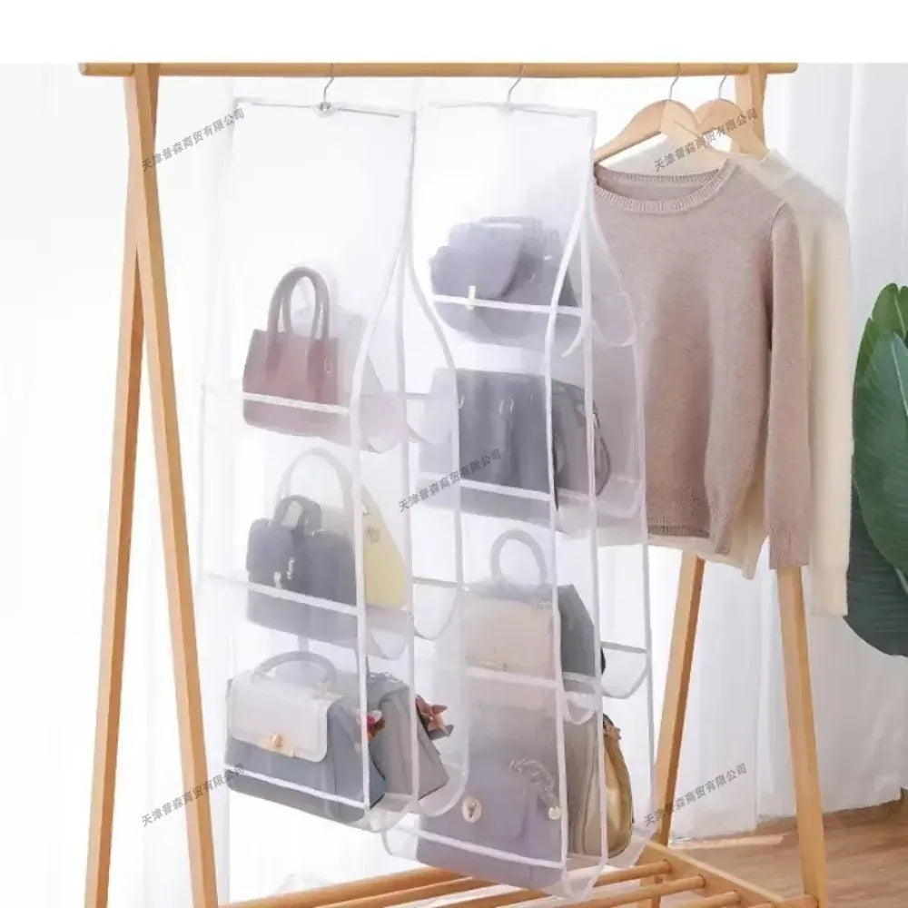 Two clear handbag organizers hanging from a clothes rail