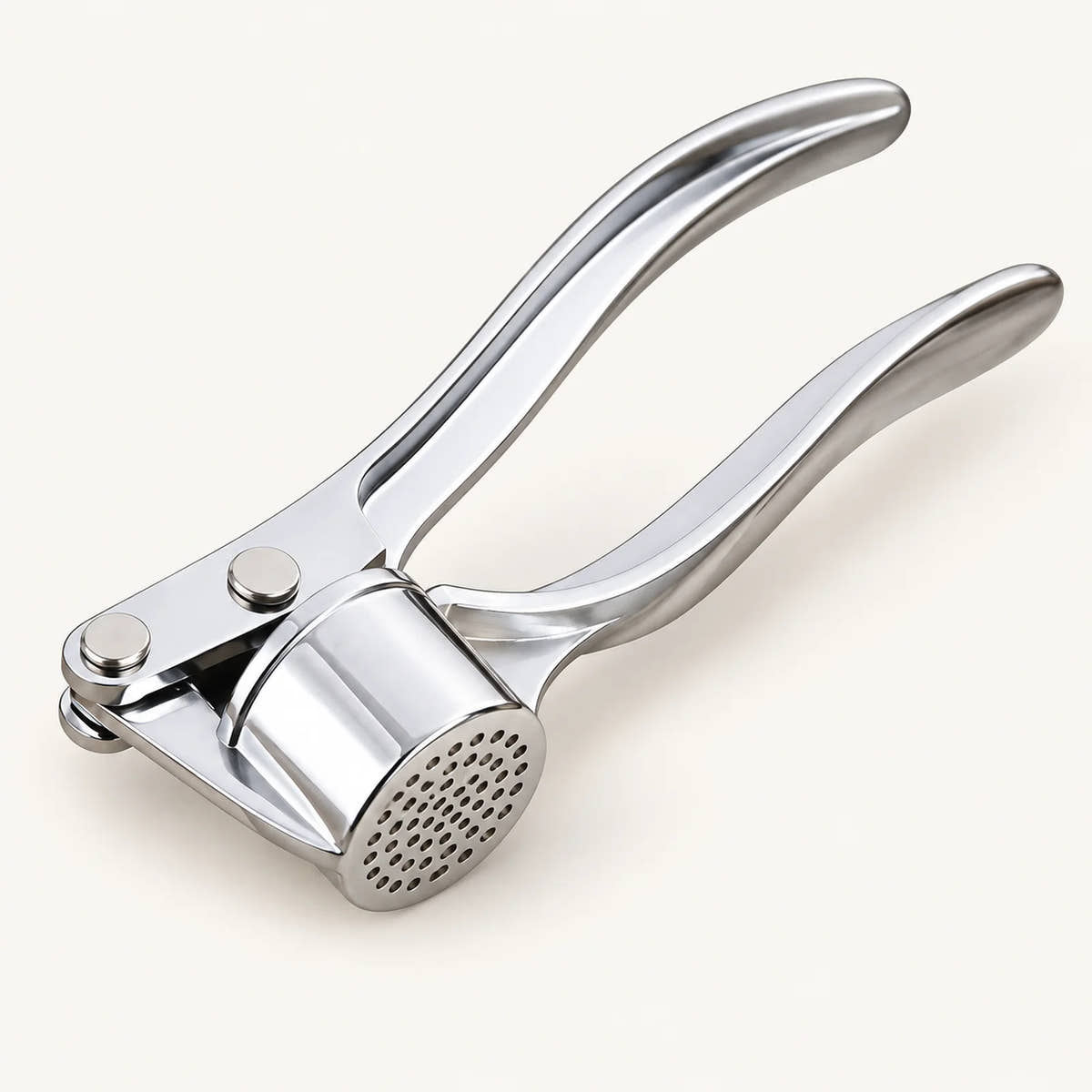 18cm Aluminum Garlic Press on a warm off-white background with a soft natural shadow.