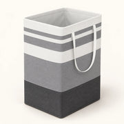 Tall grey and white striped hamper with long handles