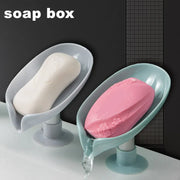 Alternate view of leaf-shaped self-draining soap dish with suction cup