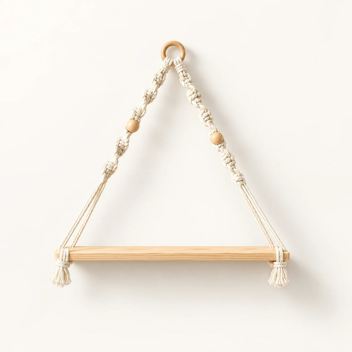 Wooden hanging shelf with braided macrame ropes