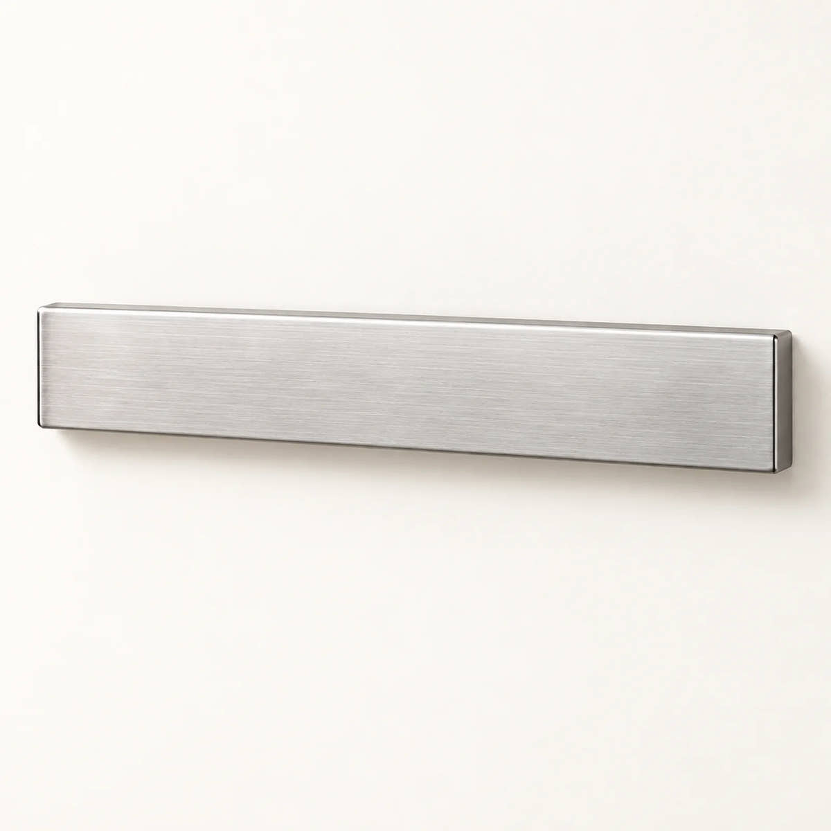 Wall-Mounted Magnetic Knife Holder on a warm off-white background with a soft natural shadow.