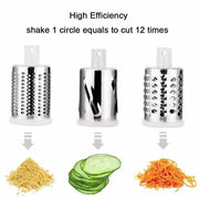 Manual rotary cheese grater with hand crank and three interchangeable drum blades