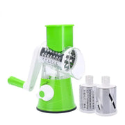 Green manual rotary cheese grater with hand crank and drum blade