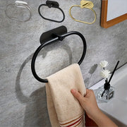 Black, silver, and gold adhesive bathroom towel rings