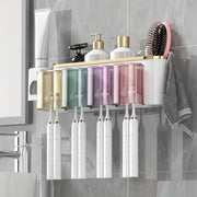 Wall-mounted toothbrush organizer holding brushes and cups