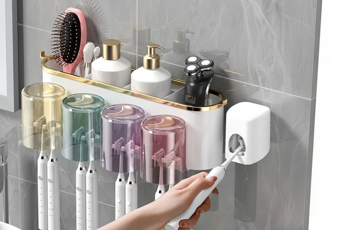 Toothpaste squeezer dispensing toothpaste beside organizer