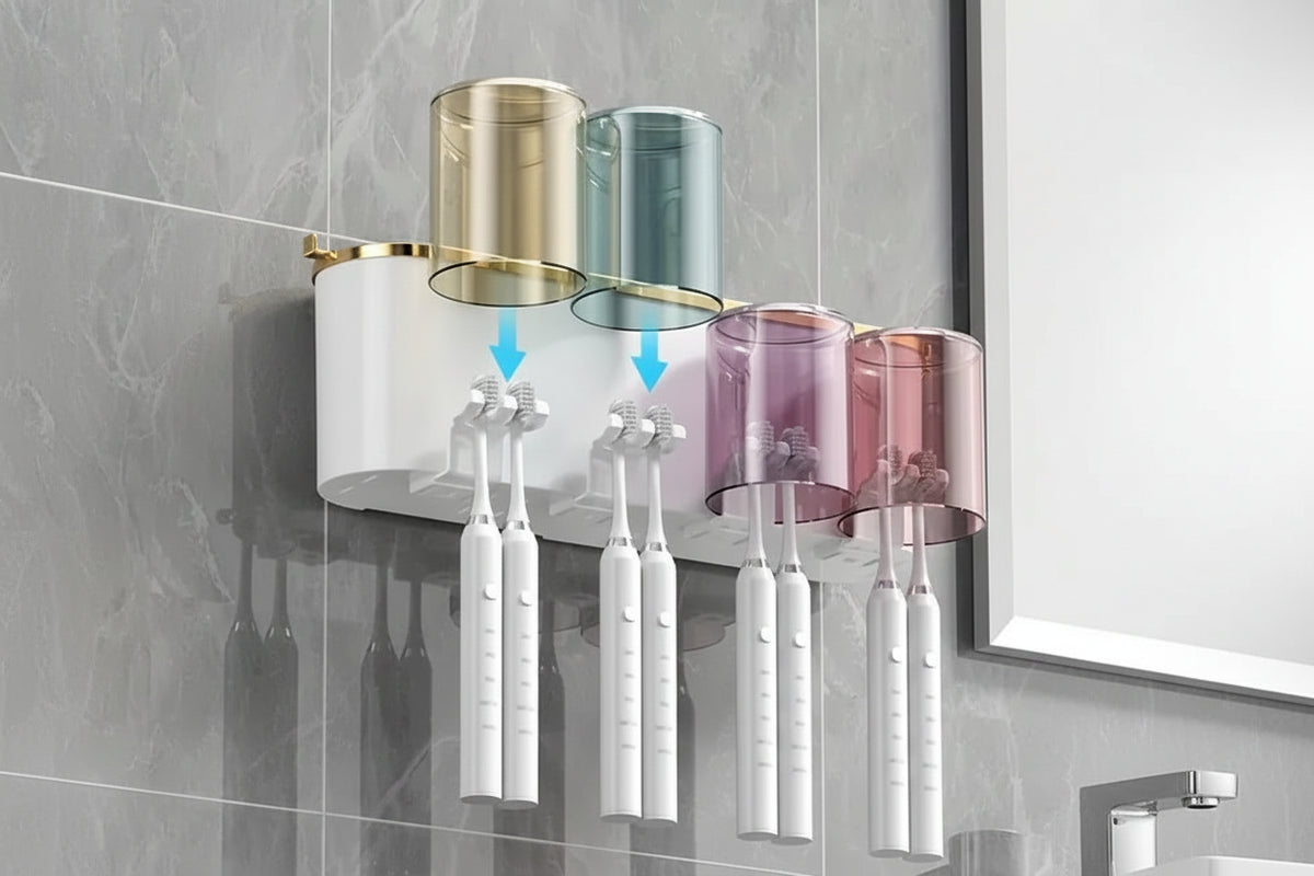 Toothbrush organizer with cups and toothbrushes mounted on tile