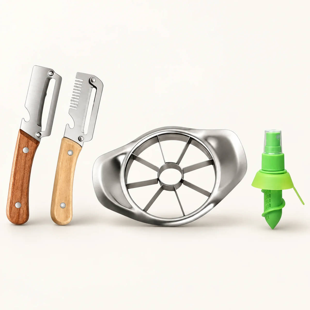 Prep Trio – Peeler, Citrus Juicer and Apple Cutter on a warm off-white background with a soft natural shadow.
