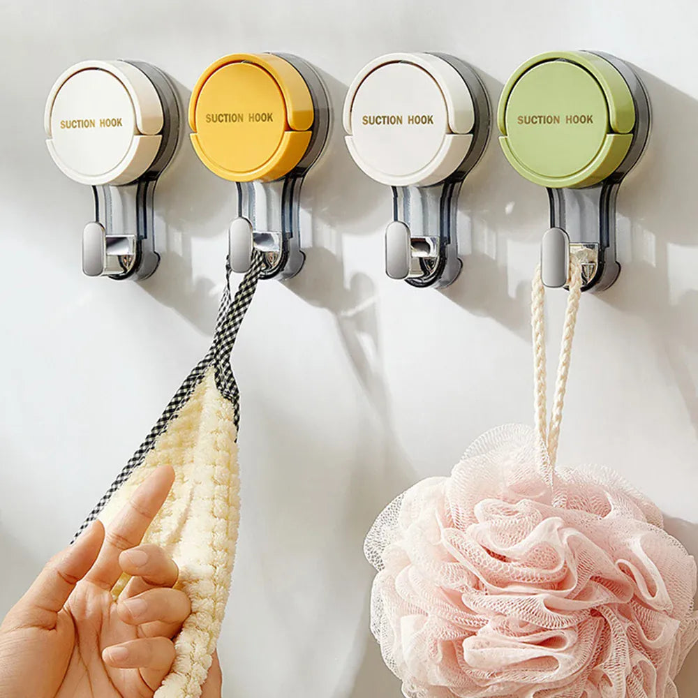 Suction hooks holding towels and bath accessories