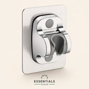 A polished chrome wall-mounted hook with a square brushed-metal backing plate, shown against a light beige background. The brand name 'ESSENTIALS House' is displayed at the bottom.