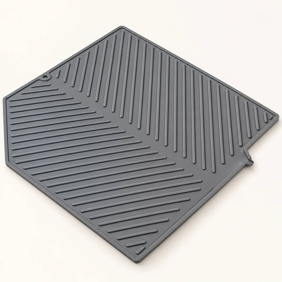 Silicone Dish Drying Mat on a warm off-white background with a soft natural shadow.