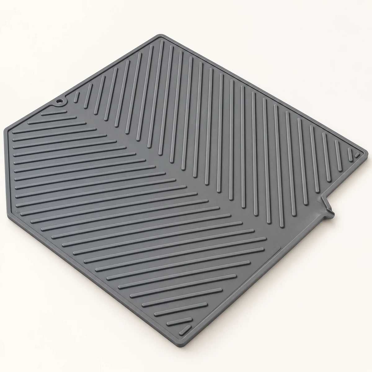 Silicone Dish Drying Mat on a warm off-white background with a soft natural shadow.